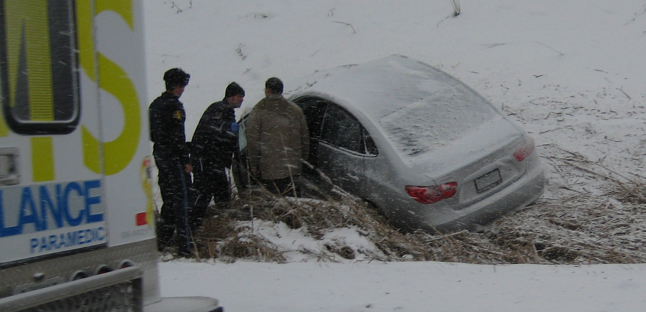 car veering off into ditch due to bad weather conditions