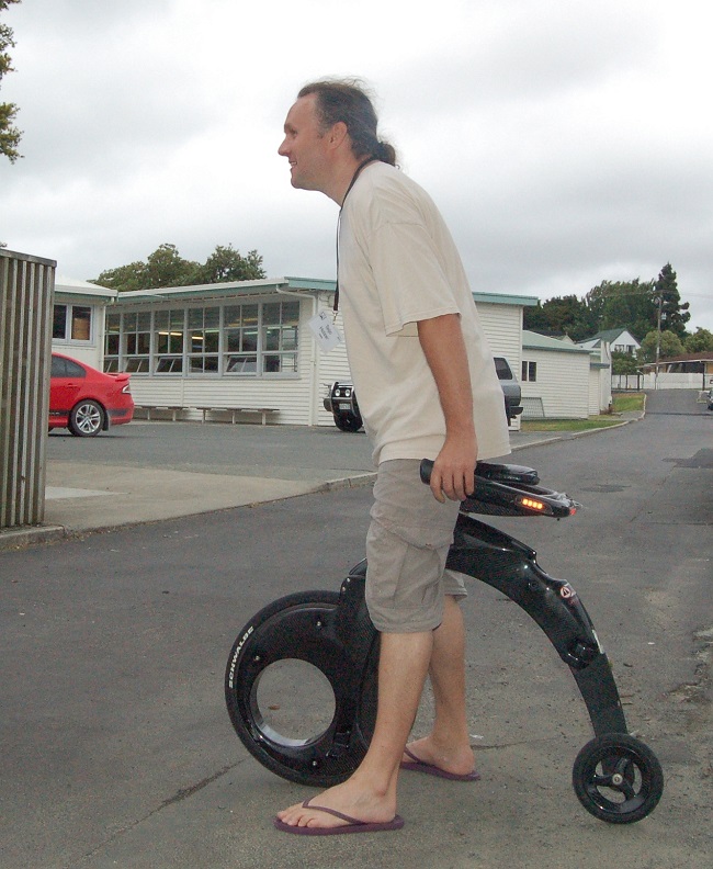 man using a yike bike