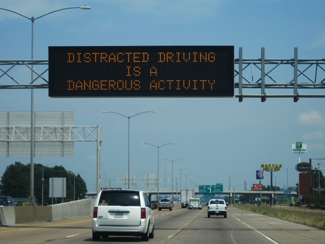 distracted driving sign on the freeway