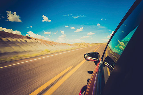 Car Driving Down the Road